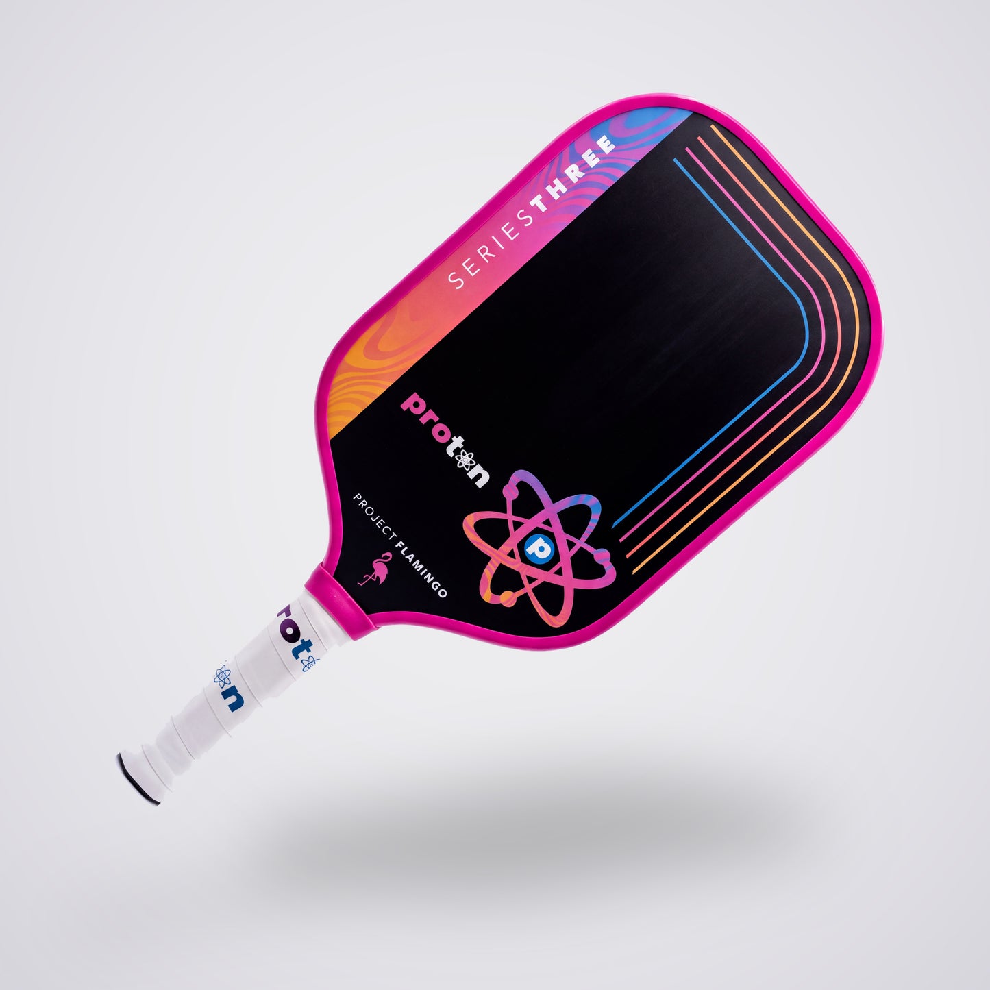 Project Flamingo Elongated 15MM pickleball paddle, angled three-quarter view