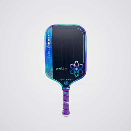 Project Peacock Elongated 13MM pickleball paddle, front face